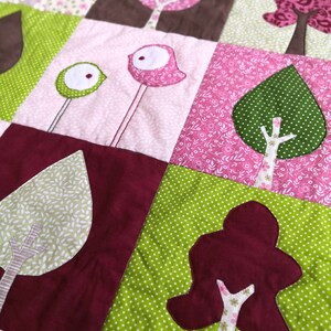 Modern baby girl quilt pattern, a spring forest with linden and chestnut tree and bird appliques. Includes a sew along video image 9