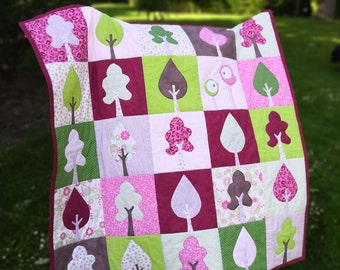 Modern baby girl quilt pattern, a spring forest with linden and chestnut tree and bird appliques. Includes a sew along video!