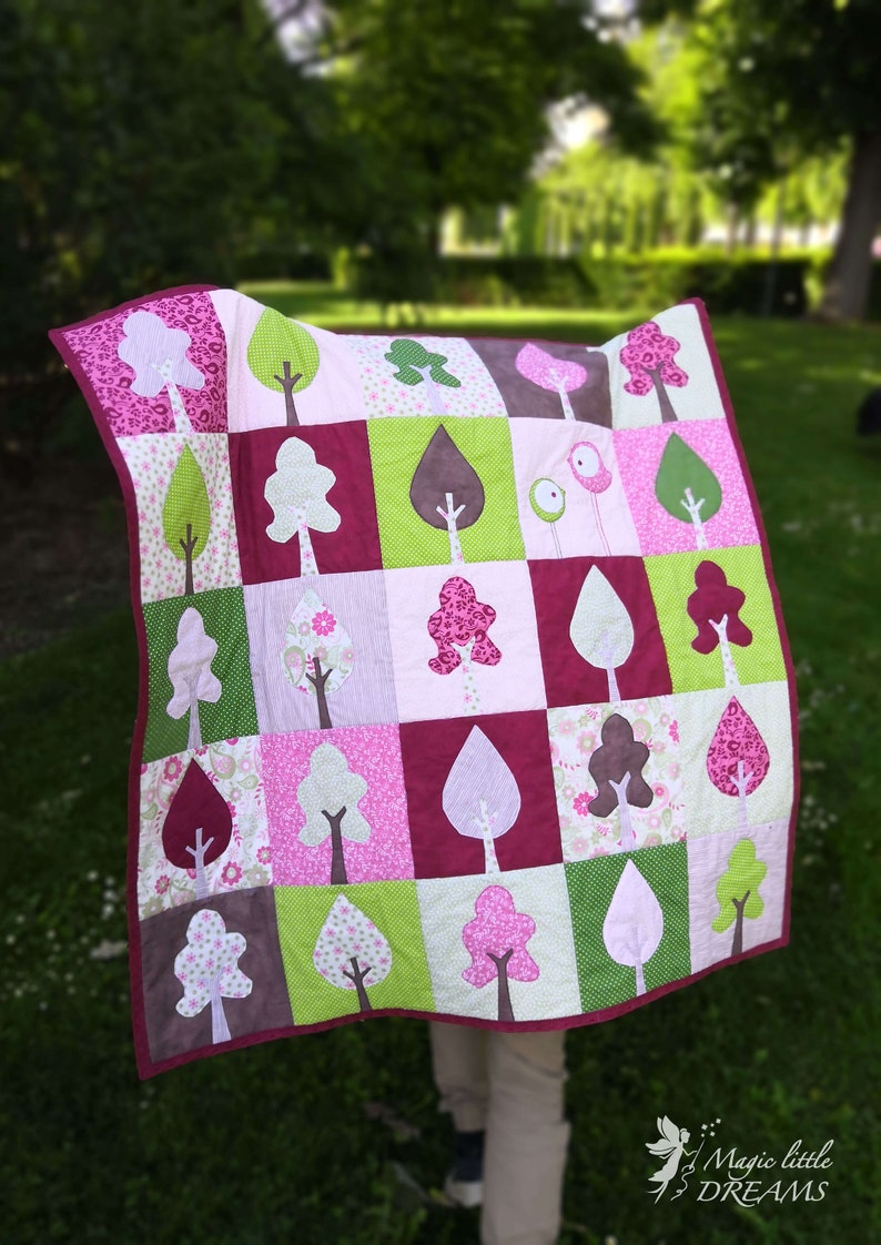 Modern baby girl quilt pattern, a spring forest with linden and chestnut tree and bird appliques. Includes a sew along video image 1