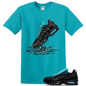 May include: A bright turquoise short-sleeve t-shirt featuring a graphic illustration of a black and turquoise trainer melting into a puddle of liquid. A matching black and turquoise trainer is positioned at the bottom right of the image.