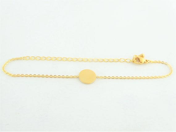 Accessorize - Bracciale rigido dorato appariscente con stelle marine