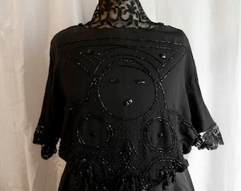 Wonderful old black blouse, embroidered with chantilly, jet lace and silk tassels. 1910s.