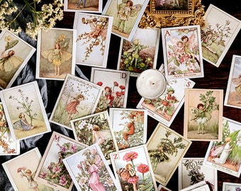 May include: A collection of vintage-style decorative paper stickers featuring fairies and flowers. Each sticker has a letter of the alphabet and a name for a flower. The stickers are printed on white paper with a light brown background.