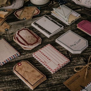 Set di etichette di carta vintage, francobolli, tag, cartolina, bobine di film, effimero, scrapbooking, set fustellato per giornali spazzatura, diario vintage