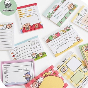 May include: A set of colorful sticky notes featuring cute cartoon characters and various designs. The notes include sections for writing titles, dates, notes, and other information. Some notes have a grid pattern, while others have a plain background. The notes are perfect for organizing tasks, taking notes, and adding a touch of whimsy to your workspace.
