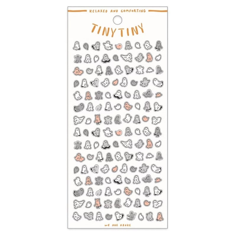 May include: A sheet of stickers featuring a variety of cute ghost illustrations in shades of gray and pink. The stickers are arranged in rows on a white background. The text "Tiny Tiny" is printed at the top of the sheet, and the text "We are Obake" is printed at the bottom.