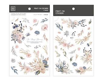 May include: Two sheets of floral print-on stickers. The stickers feature a variety of blue, pink, and gold floral designs. The text "Be Always Blooming" is printed on one sheet. The text "Print-on Stickers" is printed on both sheets.