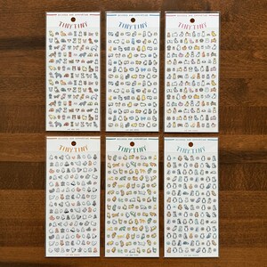 May include: Six sheets of colorful animal and bird stickers. Each sheet has a different design and features a variety of animals and birds. The stickers are perfect for adding a touch of whimsy to your planner, journal, or scrapbook.