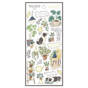 May include: A sheet of stickers featuring illustrations of plants, a dog, and home decor. The stickers are on a white background with a gray border. The text "SNUG ROOM" and "PLANT" are at the top of the sheet.