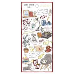 May include: A sheet of stickers featuring illustrations of a cozy room with a typewriter, books, a dog, a lamp, and a cup of coffee. The stickers are white with a red border and the text "Snug Room" and "Letter" in black.
