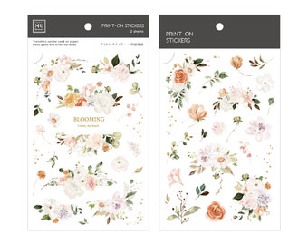 May include: Two sheets of floral print-on stickers with a watercolor design. The stickers feature a variety of flowers in shades of pink, white, and orange. The text "BLOOMING" and "Listen, my heart" is printed on the stickers.