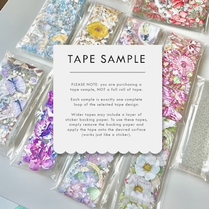 May include: A close-up of several clear plastic bags containing colorful patterned washi tape samples. The text on the white card reads "TAPE SAMPLE" and includes instructions on how to use the tape.