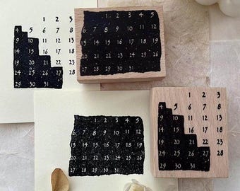 Kalendarzowe stemple polimerowe oprawione w drewno