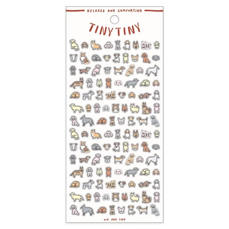 May include: A sheet of stickers featuring various dog breeds in different poses. The stickers are outlined in black and filled with pastel colors. The sheet is white with the text "RELAXED AND COMFORTING" and "TINY TINY" at the top and "WE ARE INU" at the bottom.