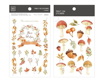 May include: Two sheets of autumn-themed stickers featuring mushrooms, acorns, leaves, and berries. The first sheet has a wreath with the text "Best Wishes" and the second sheet has a variety of fall foliage and mushrooms.
