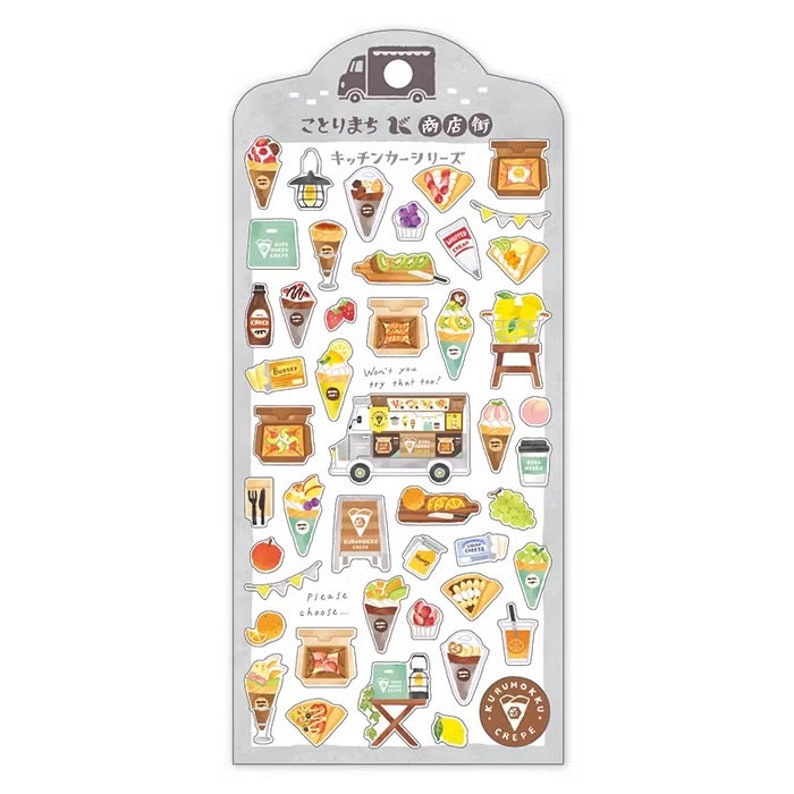 May include: A sheet of colorful stickers featuring a variety of illustrations of food trucks, crepes, and other food items. The stickers are designed in a cartoon style and feature bright colors and playful details. The text on the sheet reads "Kuru Kuru Crepe" and "Kitchen Car Series".