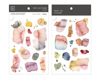 Pode incluir: Duas folhas de adesivos de aquarela para impressão. Os adesivos apresentam formas abstratas em tons de rosa, azul, amarelo, verde e marrom. Os adesivos podem ser usados em papel, madeira, vidro e outras superfícies.