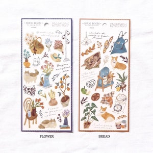 May include: Two sheets of stickers with illustrations of flowers, plants, animals, and other objects. The sheet on the left has the word "FLOWER" printed at the bottom. The sheet on the right has the word "BREAD" printed at the bottom.