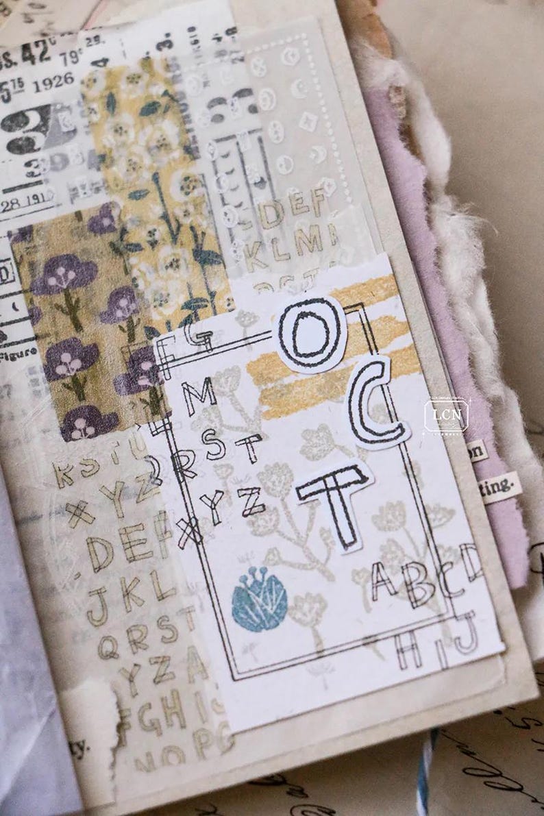 May include: A collage of vintage ephemera with floral and alphabet designs. The composition includes layered paper, stamps, and decorative tape. The color palette features muted tones of beige, yellow, and purple.
