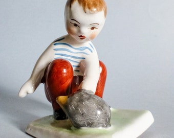 Vintage  porcelain child figurine,Hungarian pottery,little boy with hedgehog FREE SHIPPING