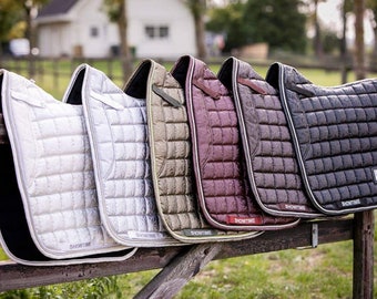Dressage saddle pad in beautifull colors, with glossy flower pattern and luxurious design