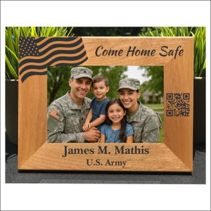 May include: Wooden picture frame with a family photo. The frame has an American flag design and the words "Come Home Safe." The bottom of the frame reads "James M. Mathis U.S. Army."