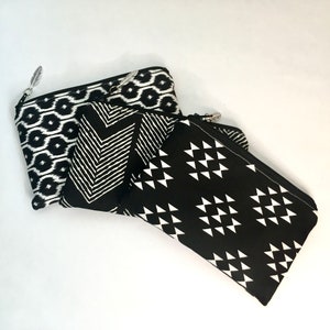 Black and white ikat print coin purse. Aztec bag. Small pouch. Small make-up bag. Sunglasses case. Ikat bag. Boho bag. Black and white bag.