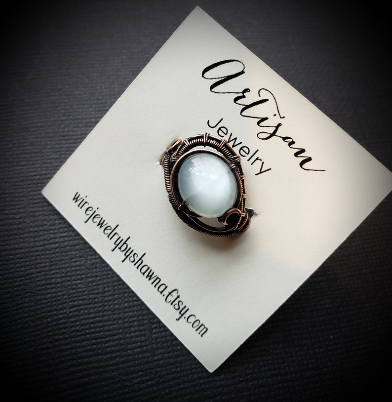 White Moonstone Ring Handmade wire woven ring Antiqued copper wire Beatiful shimmer Ornate wire woven ring Smooth oval gemstone Size 7