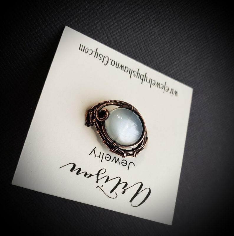 White Moonstone Ring Handmade wire woven ring Antiqued copper wire Beatiful shimmer Ornate wire woven ring Smooth oval gemstone Size 7
