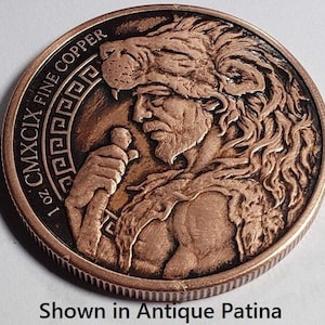 a coin with a picture of a man with a beard