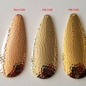 four different types of nail tips in different colors
