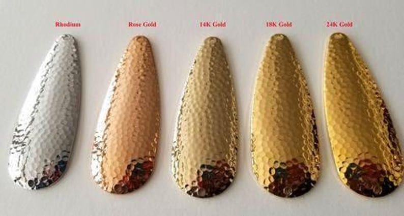 four different types of nail tips in different colors