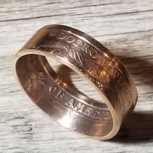 2014 Woodrow Wilson 1 Dollar Coin Ring. Shown in Rose Gold Finish (other options in Silver, 24K Gold, Platinum, Rhodium & White Gold Plated)