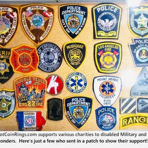 a group of police badges mounted on a wall