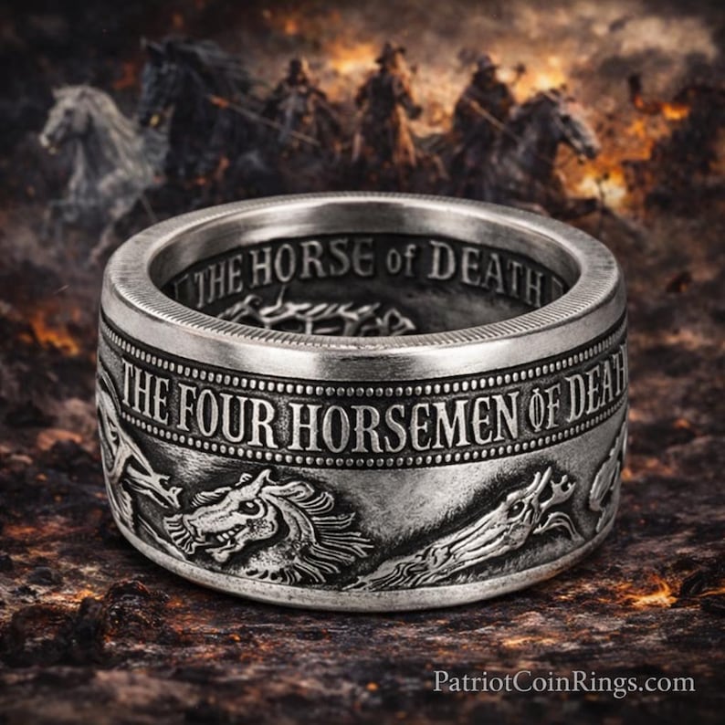 A silver ring with a detailed design featuring horses and the text "THE HORSE OF DEATH" engraved on it.