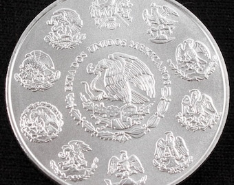 2015 1 oz Silver Mexican Libertad Coin, Symbol of triumph of good over evil!