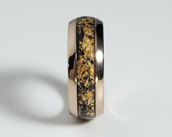 This ring was made specifically for Elyssia Young.  8mm Tungsten Steel in 14k Rose Gold with crushed Black Onyx and real 24k Gold Inlay!