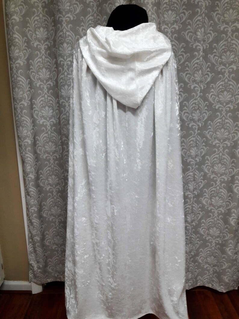 white cloak with hood and sleeves