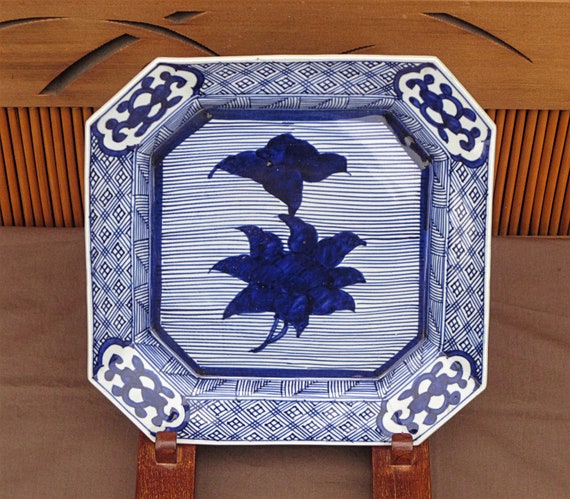 Square blue and white porcelain plate signature antique Japanese hand formed vines hand painted dark blue flowers 45 degree corners