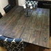 Farmhouse Dining Table with decorative bolt and brackets