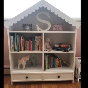 Bookcase/dollhouse with drawers and scalloped roof