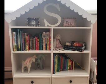 Bookcase/dollhouse with drawers and scalloped roof