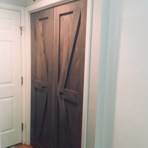 Bi-fold barn door