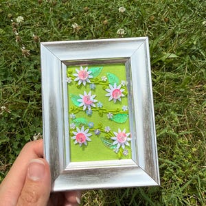 White and pink flower vine bead and sequence framed artwork