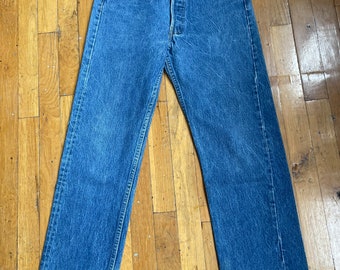 Vintage 80s Levi's 501XX red tab button fly classic blue jeans