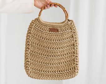 Bag with bamboo handle