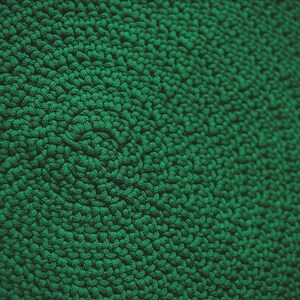 May include: Close-up of a green textured fabric with a repeating pattern of small loops.