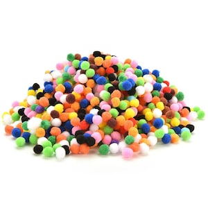 May include: A large pile of colourful pom-poms in various shades of red, orange, yellow, green, blue, purple, brown, black, and white.