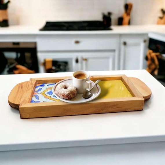 Olive wood carved with an intricate Alhambra geometric inlay pattern — functional art that looks like it belongs in a museum gift shop (but better).