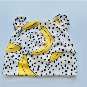 Eddie & Bee organic cotton Baby hat with ears  in cream &quot;banana pop!&quot; print.
